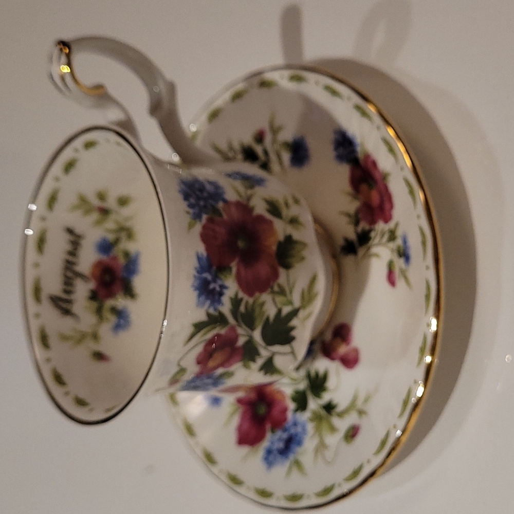 2003  Royal Albert bone China teacup and saucer poppy flower of  months series